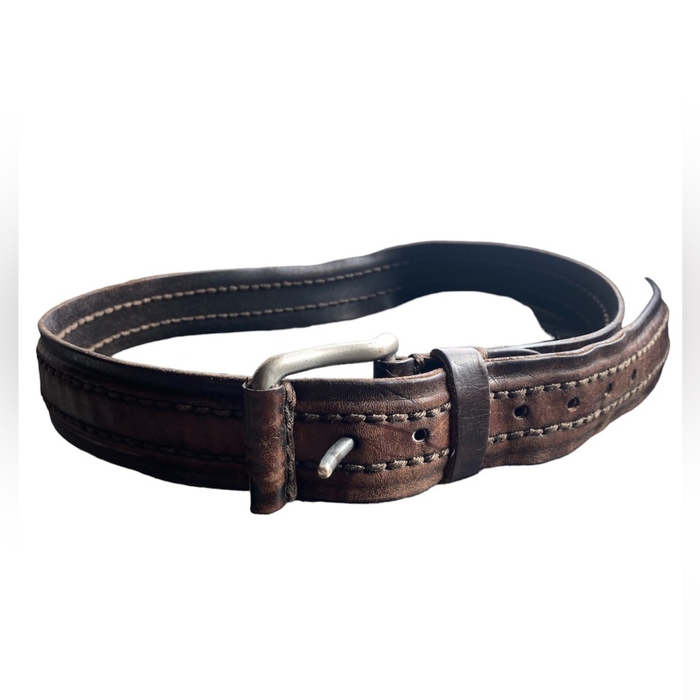 Rustic means leather belt, weathered brown leather. Size 32